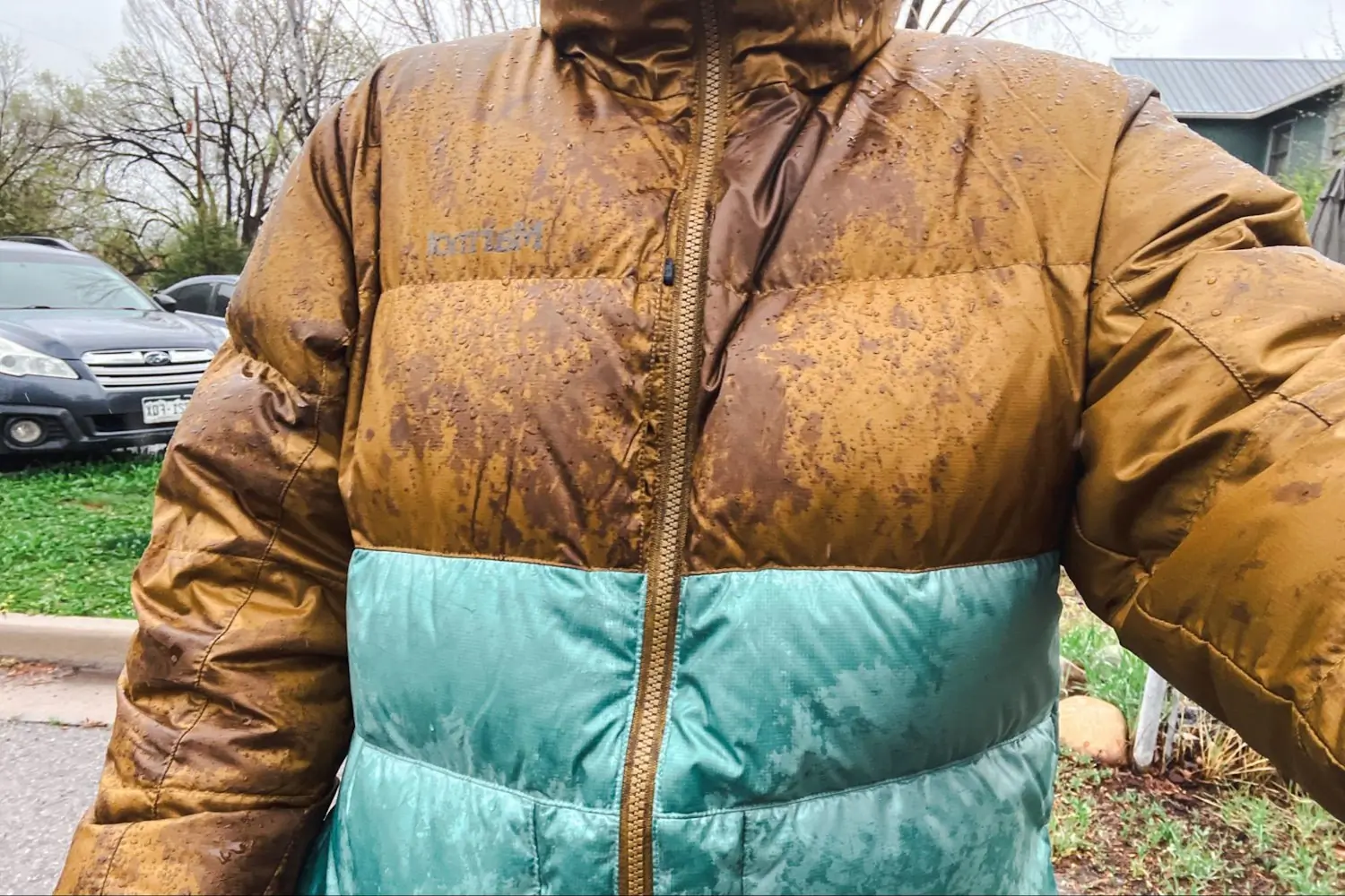Close-up of marmot women's guide hoody, with raindrops on the fabric