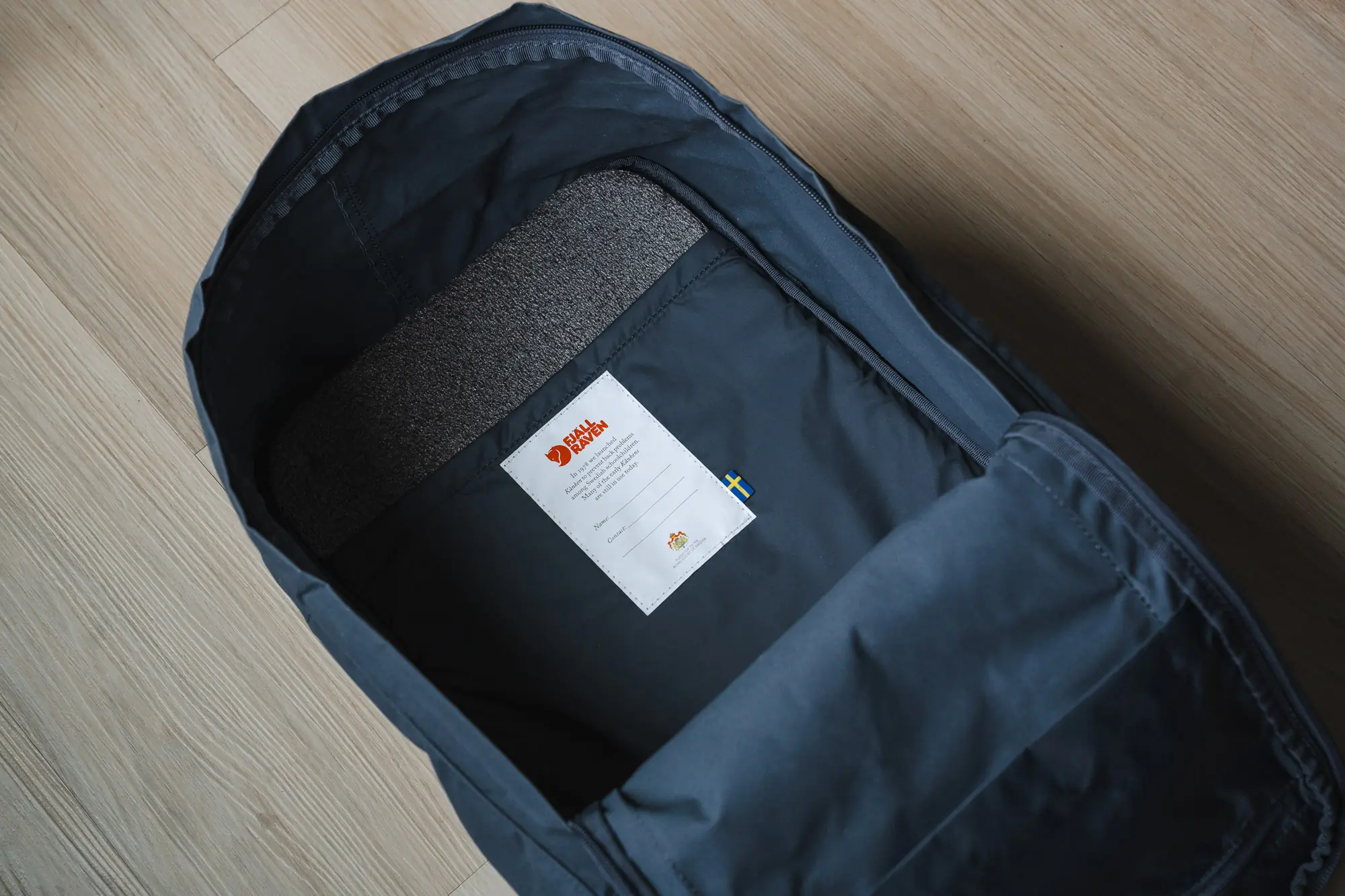 the interior of the kanken pack, showing the foam pad back panel