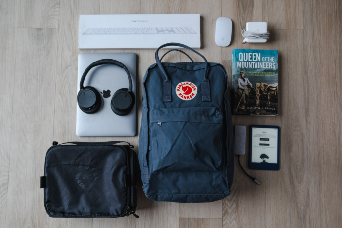 a top-down view of the contents of an average day using the kanken pack