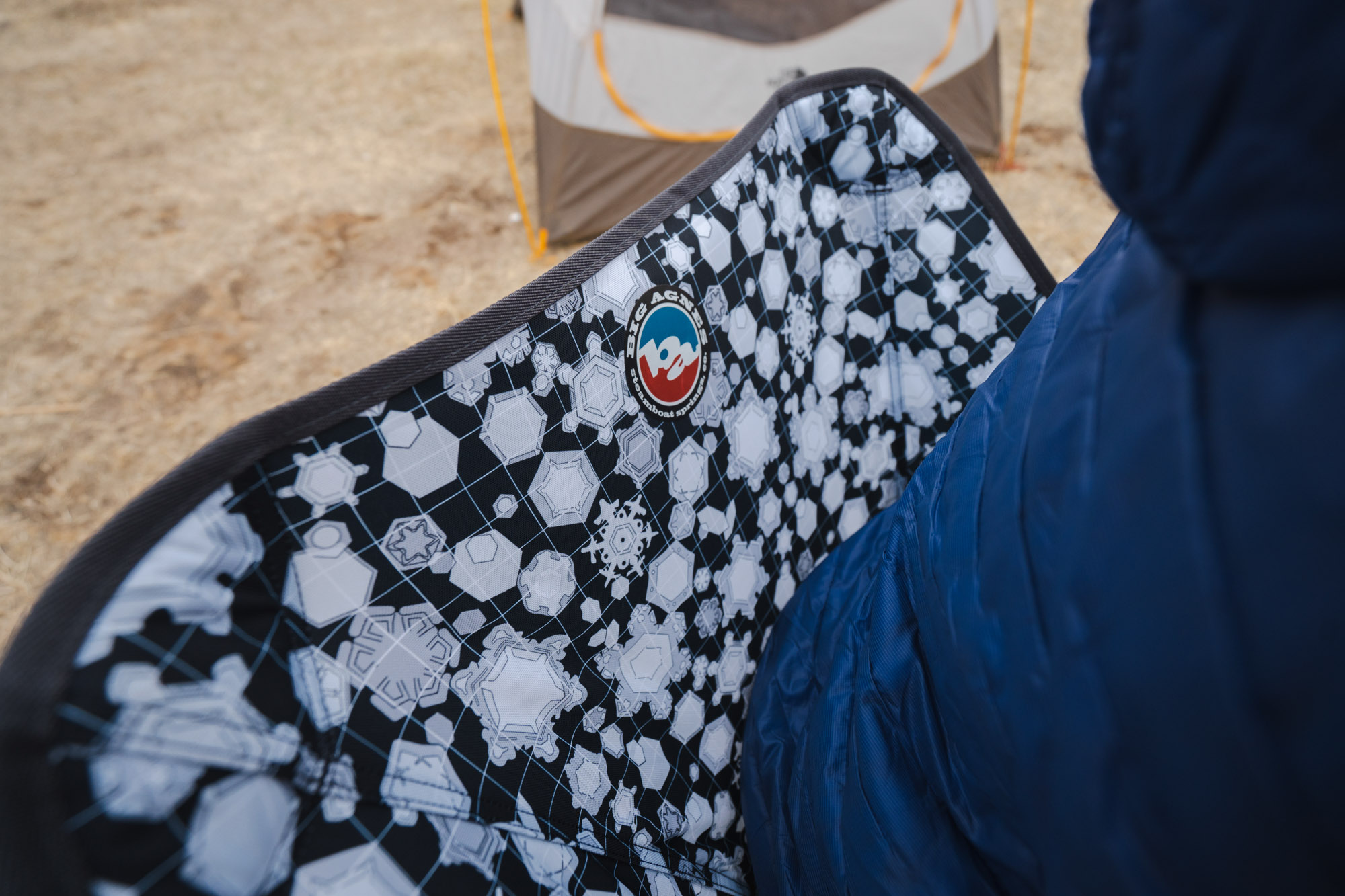 The back of the mica basin chair, showing the print — an image of snow crystals