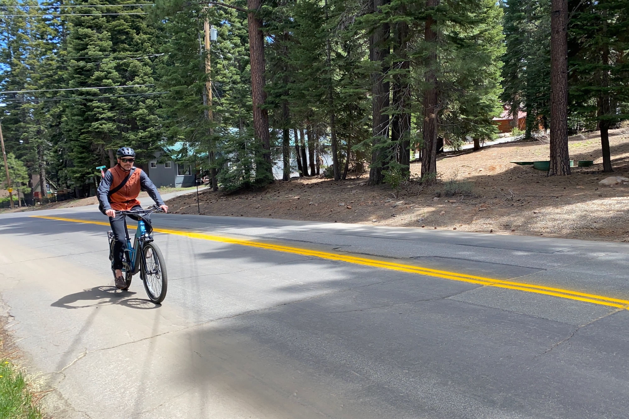 The author riding the Rad Power Radster Road up a hill