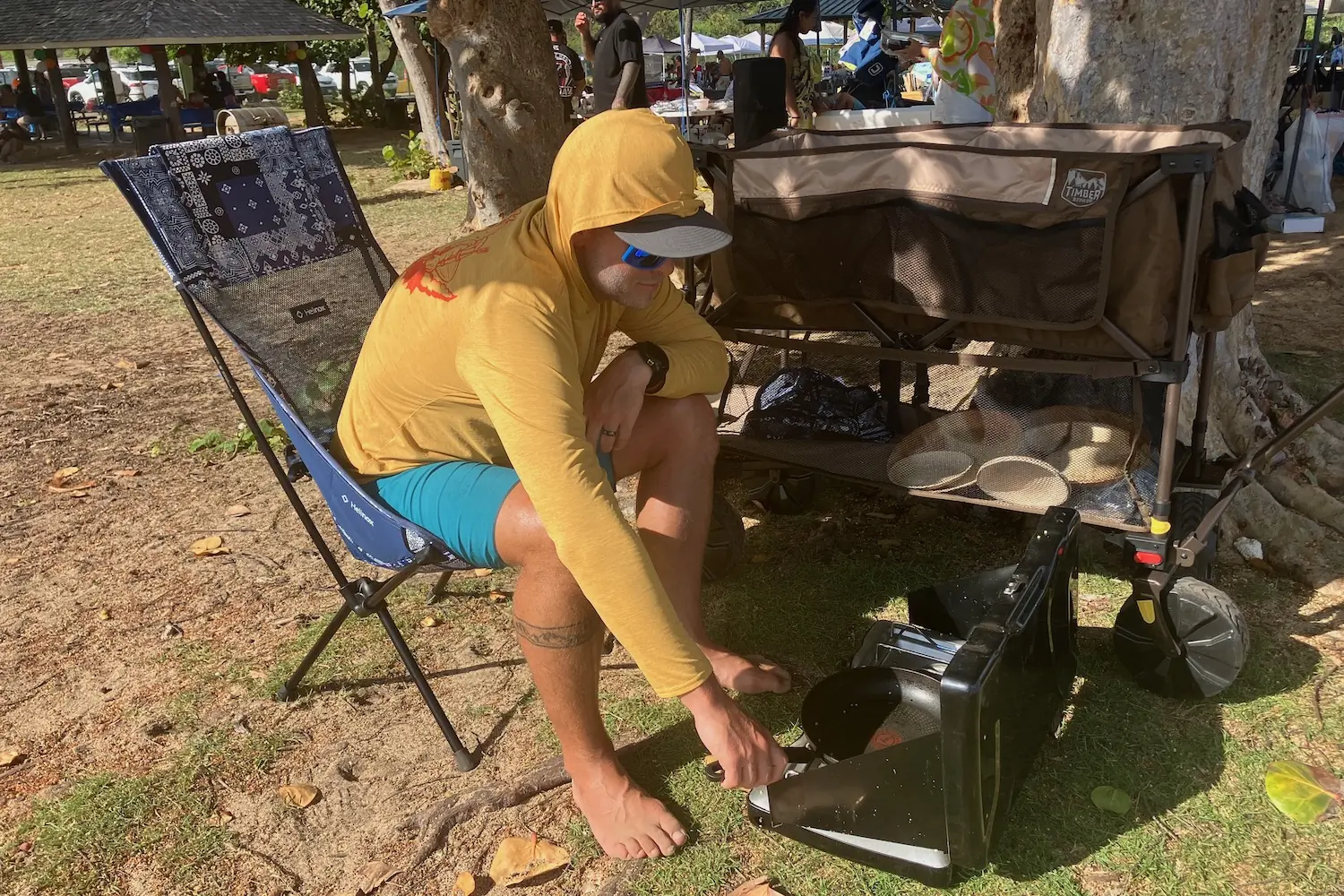 Setting up a camp stove in the park after hauling cooking gear and food in the Timber Ridge Double Decker Wagon