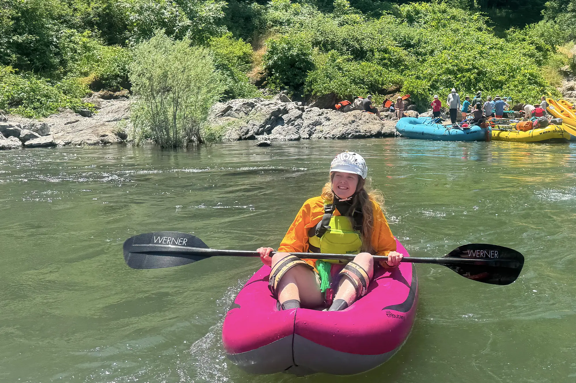 woman inside aire spud inflatable kayak