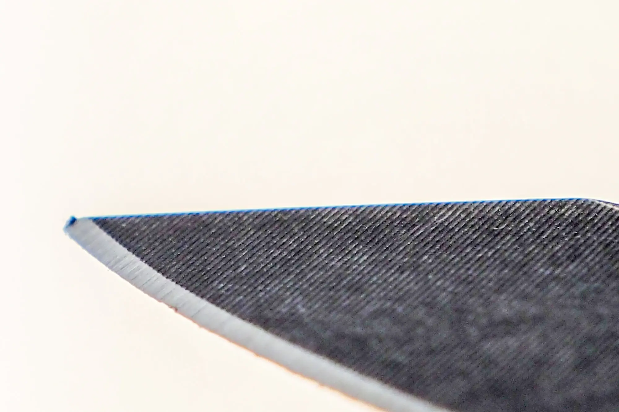 Dinged tip on Benchmade Osborne edge