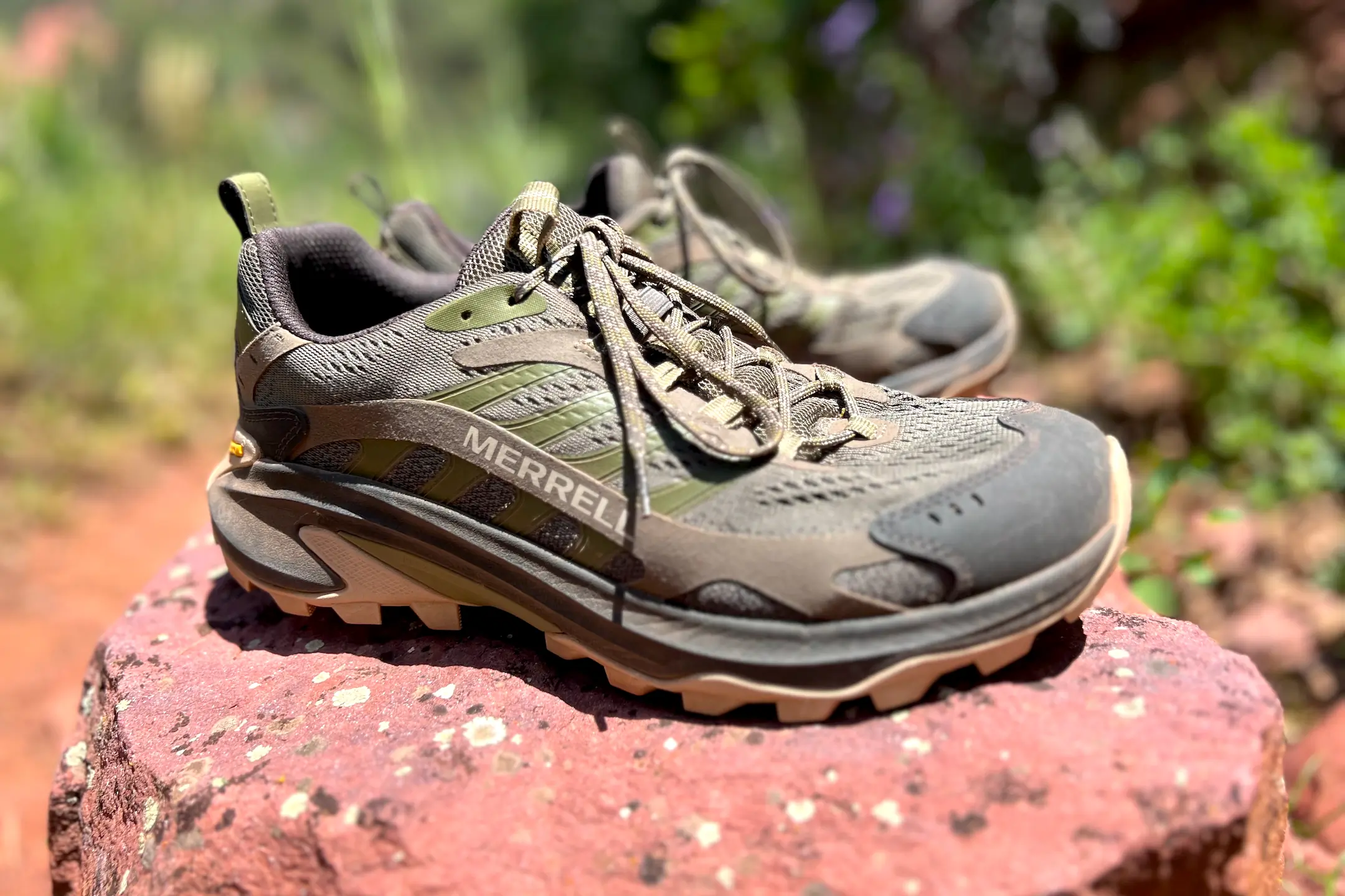 Merrell Moab Speed 2 hiking shoes being tested on outdoor mountain trails
