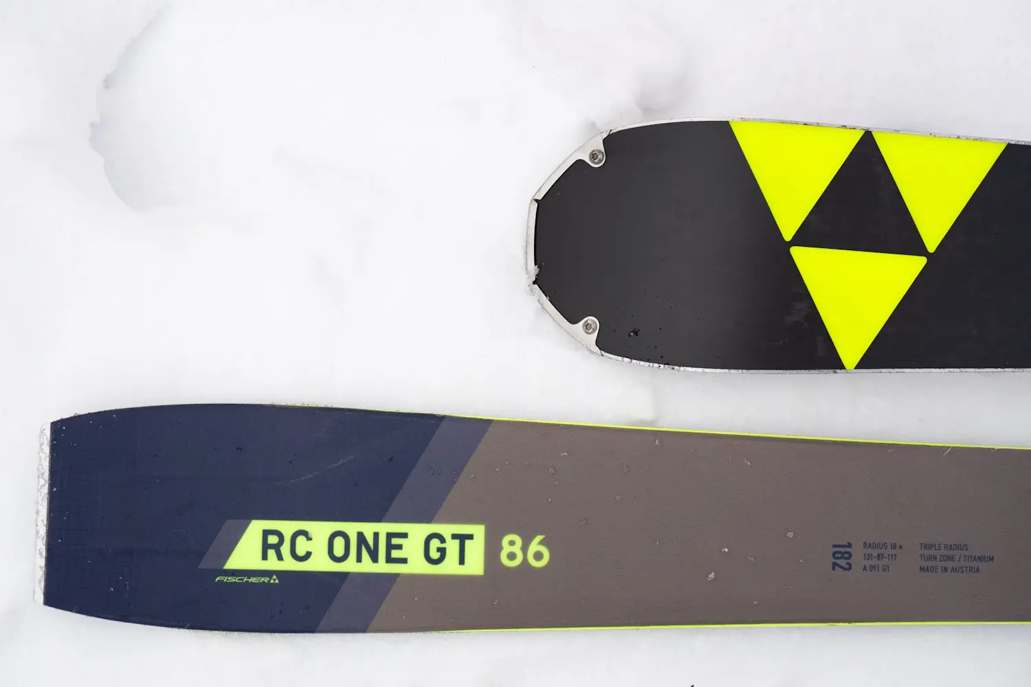 Close-up of Fischer RC One GT 86 skis on snow