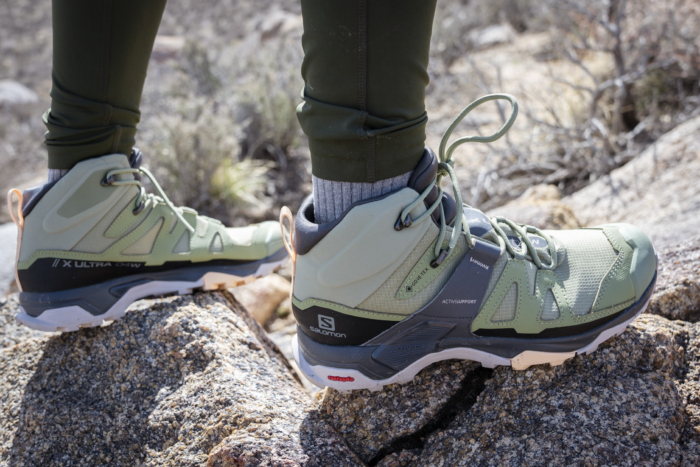 close up of light green salomon x ultra 4 mid gtx hiking boots
