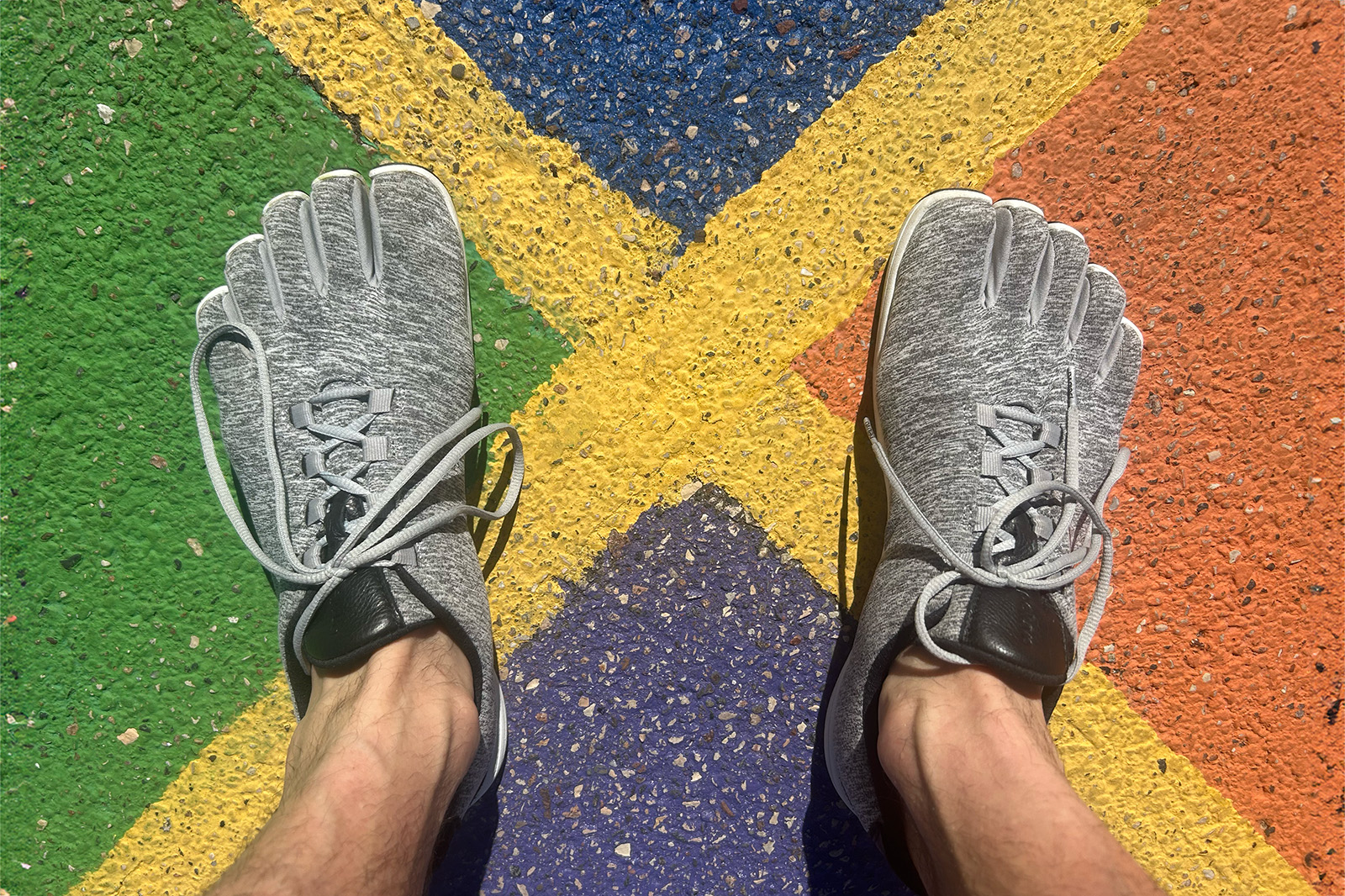 Peluva lightweight trainer toe shoe on colorful background