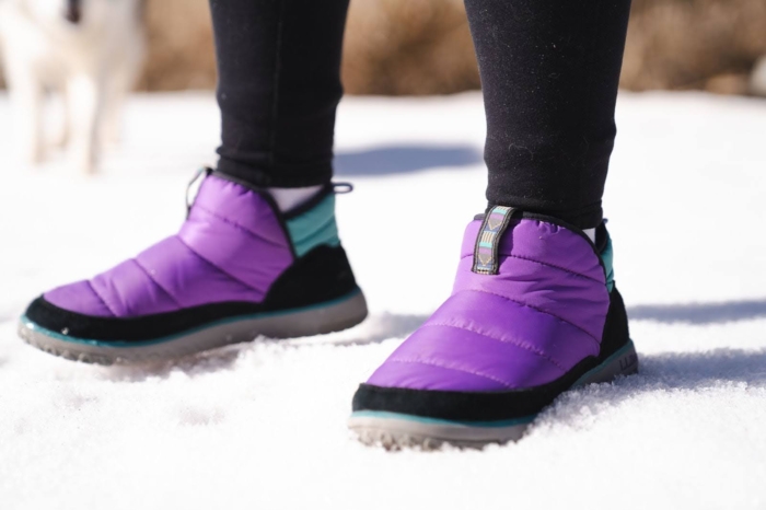 the mountain classic booties on the snow