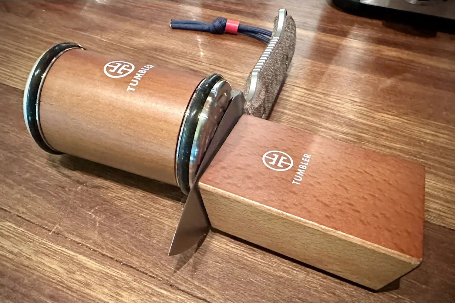 Tumbler Original Diamond Rolling Knife Sharpener Set, featuring a cylindrical wooden sharpener with metal rims and a magnetic knife