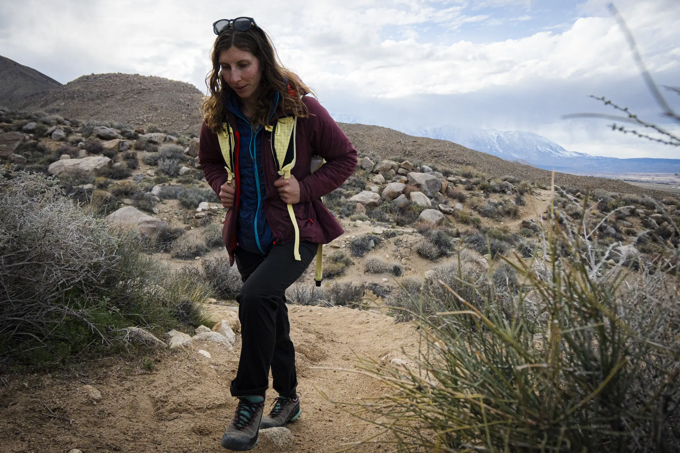 woman hiking in patagonia quandary pants