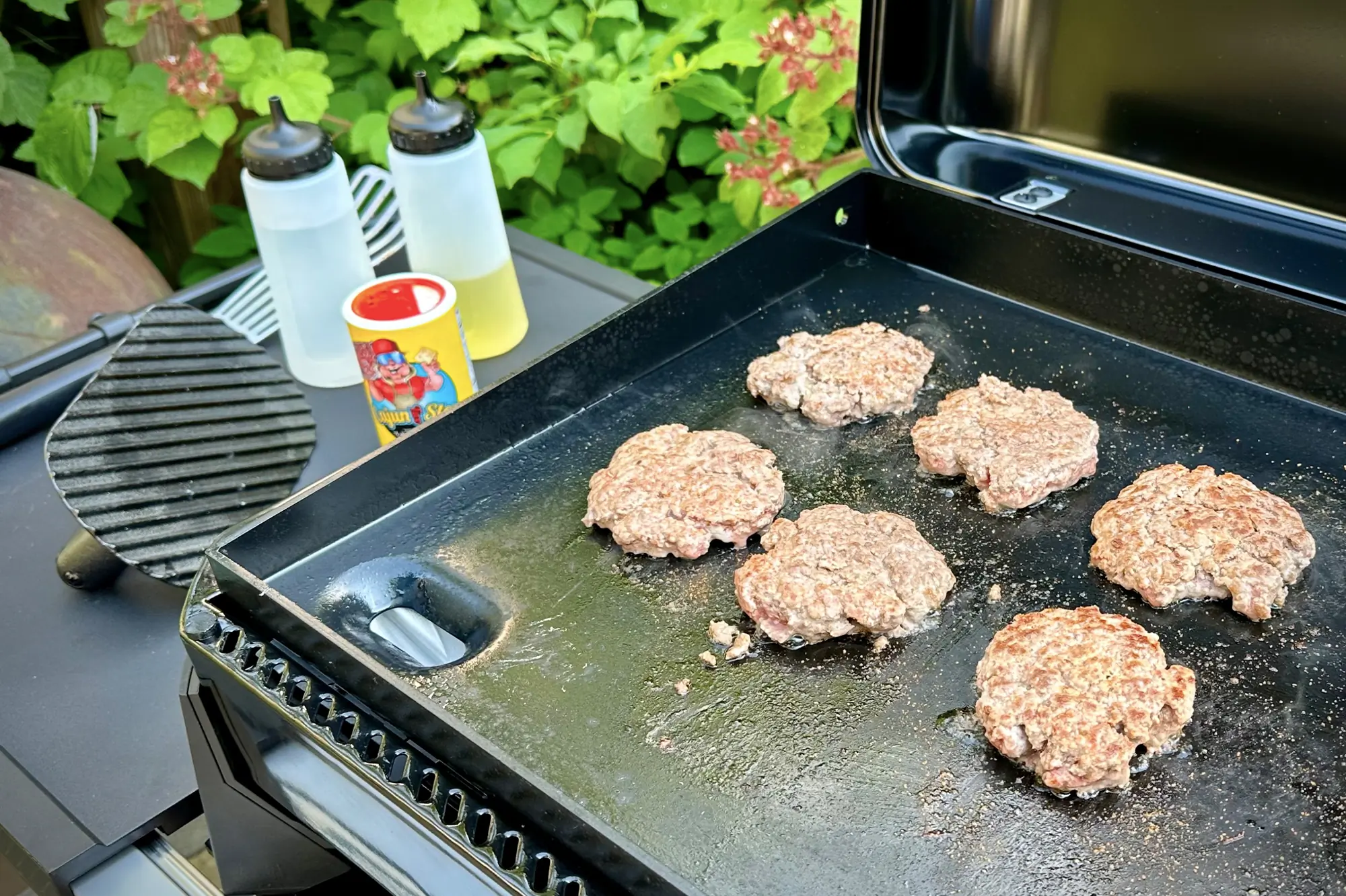 six smash burgers on weber traveler 22 griddle
