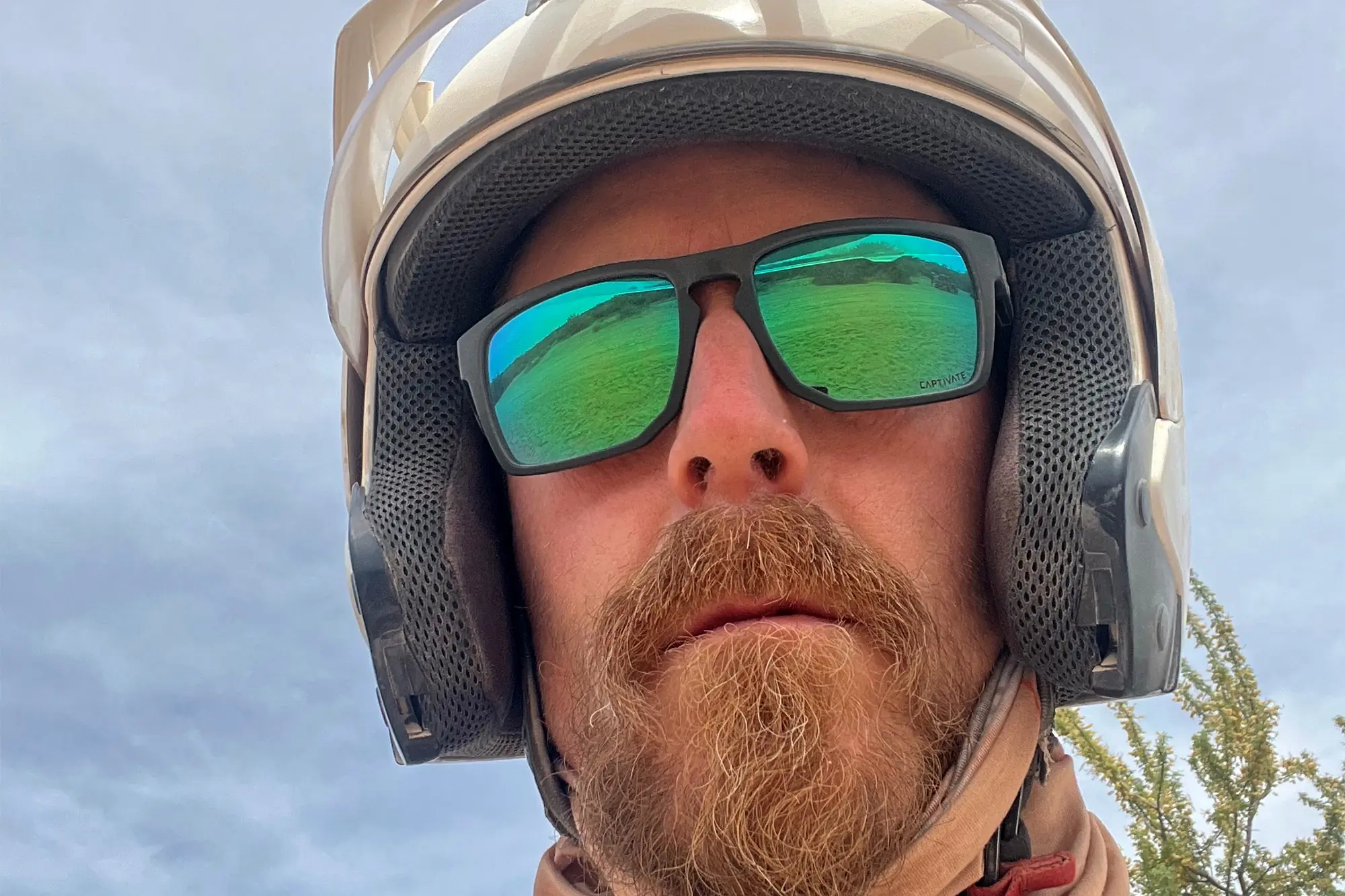 Man wearing Wiley X Founder sunglasses and helmet