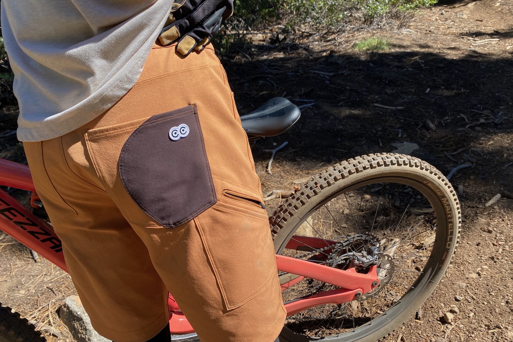 Wearing the Curious Creatures Ramble Scramble Long mountain bike shorts out on a ride