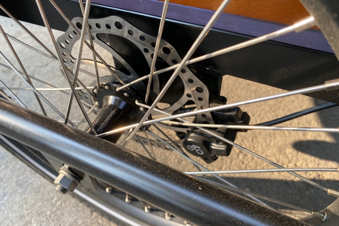 The hydraulic disc brake rotor and caliper on the Ferla Royce 2 electric cargo bike