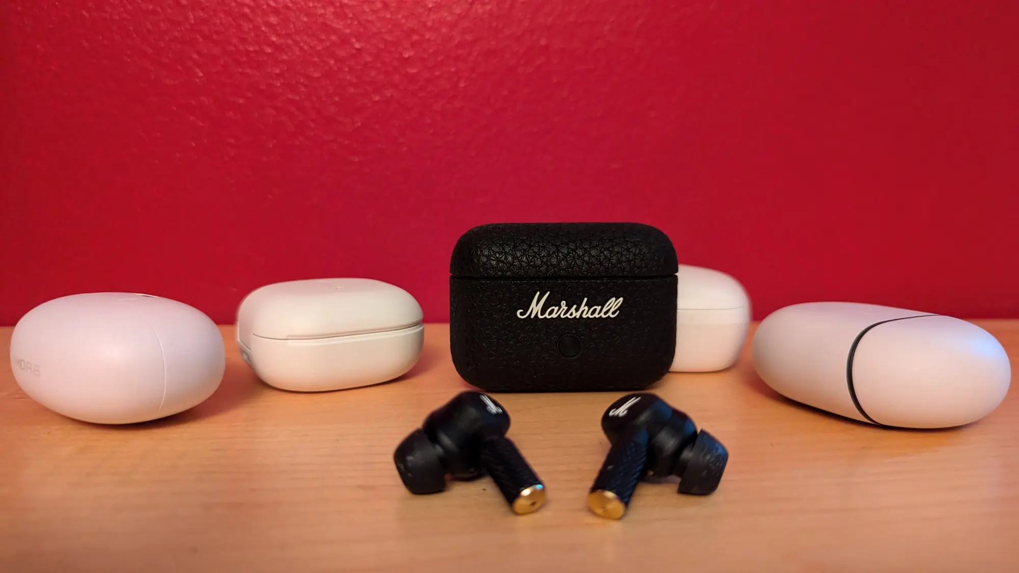 Gear Junkie - Best Wireless Earbuds - Marshall’s Motif II vs plain white earbuds cases