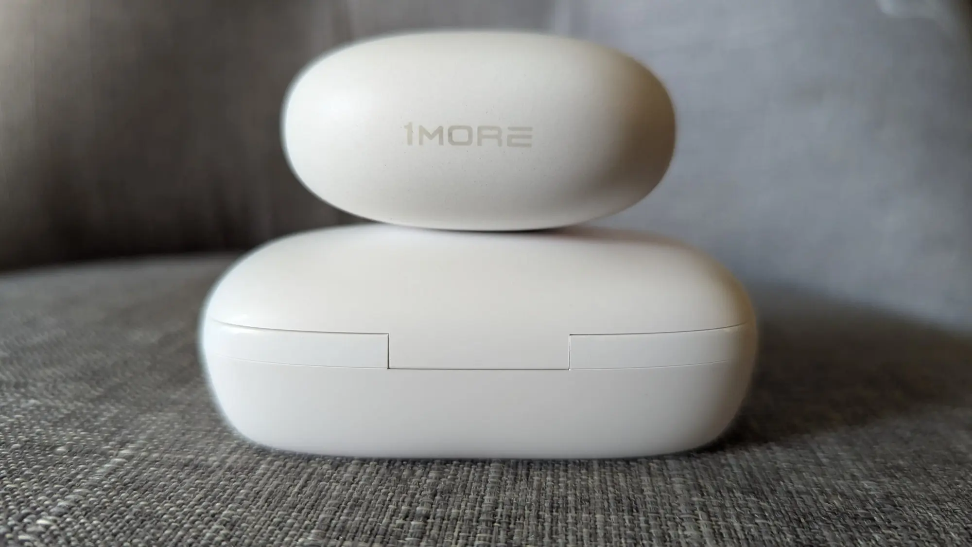 Gear Junkie - Best Wireless Earbuds - Comparing the case sizes of Tribit’s FlyBuds 3 vs. 1More’s Sleeping Earbuds Z30