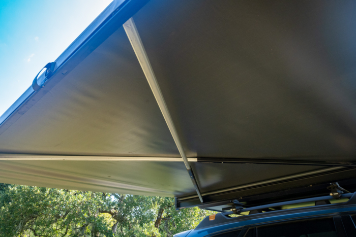 Support arms under the awning fabric on the Kammok Crosswing