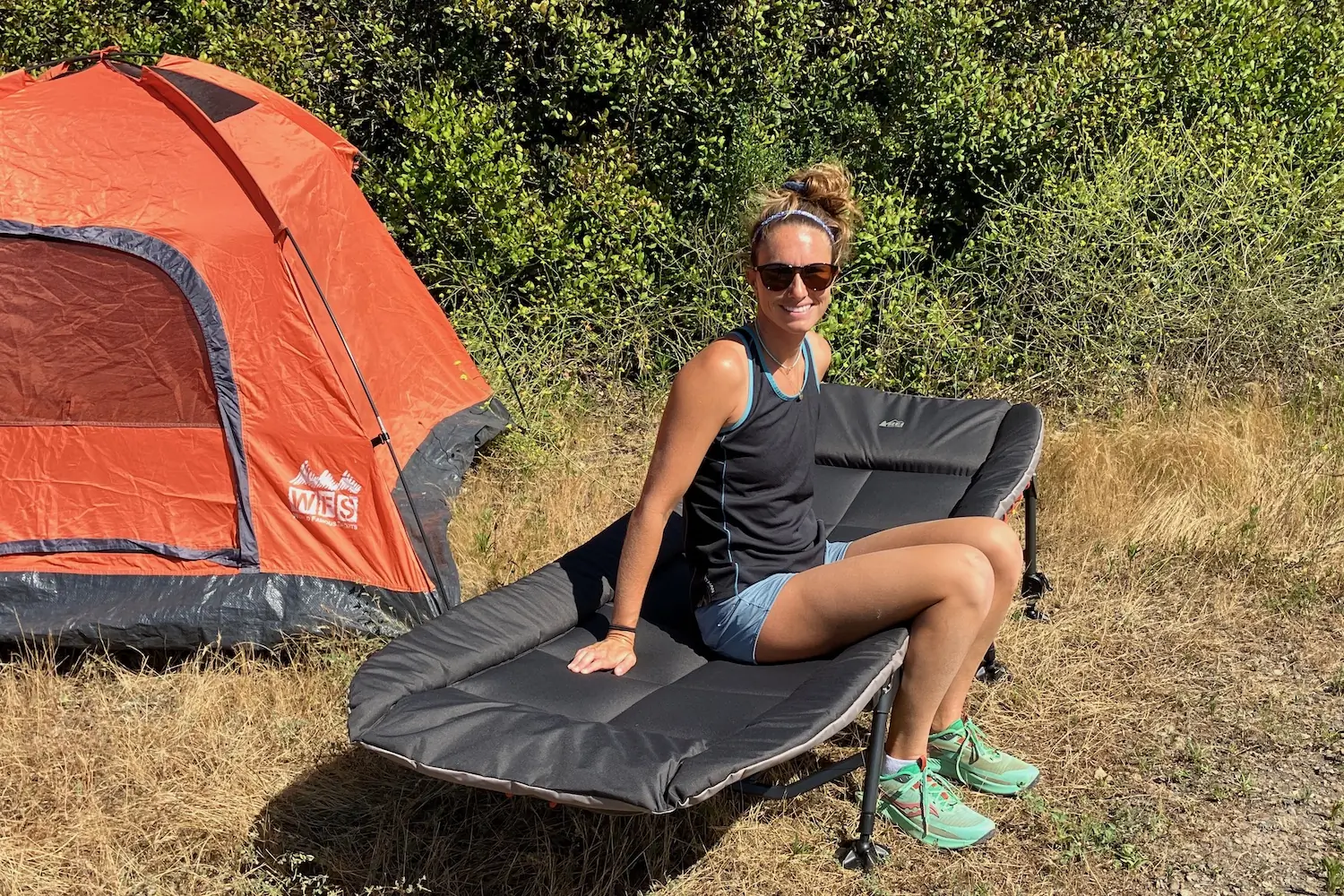 The author wearing the Smith Wander sunglasses on a camping trip