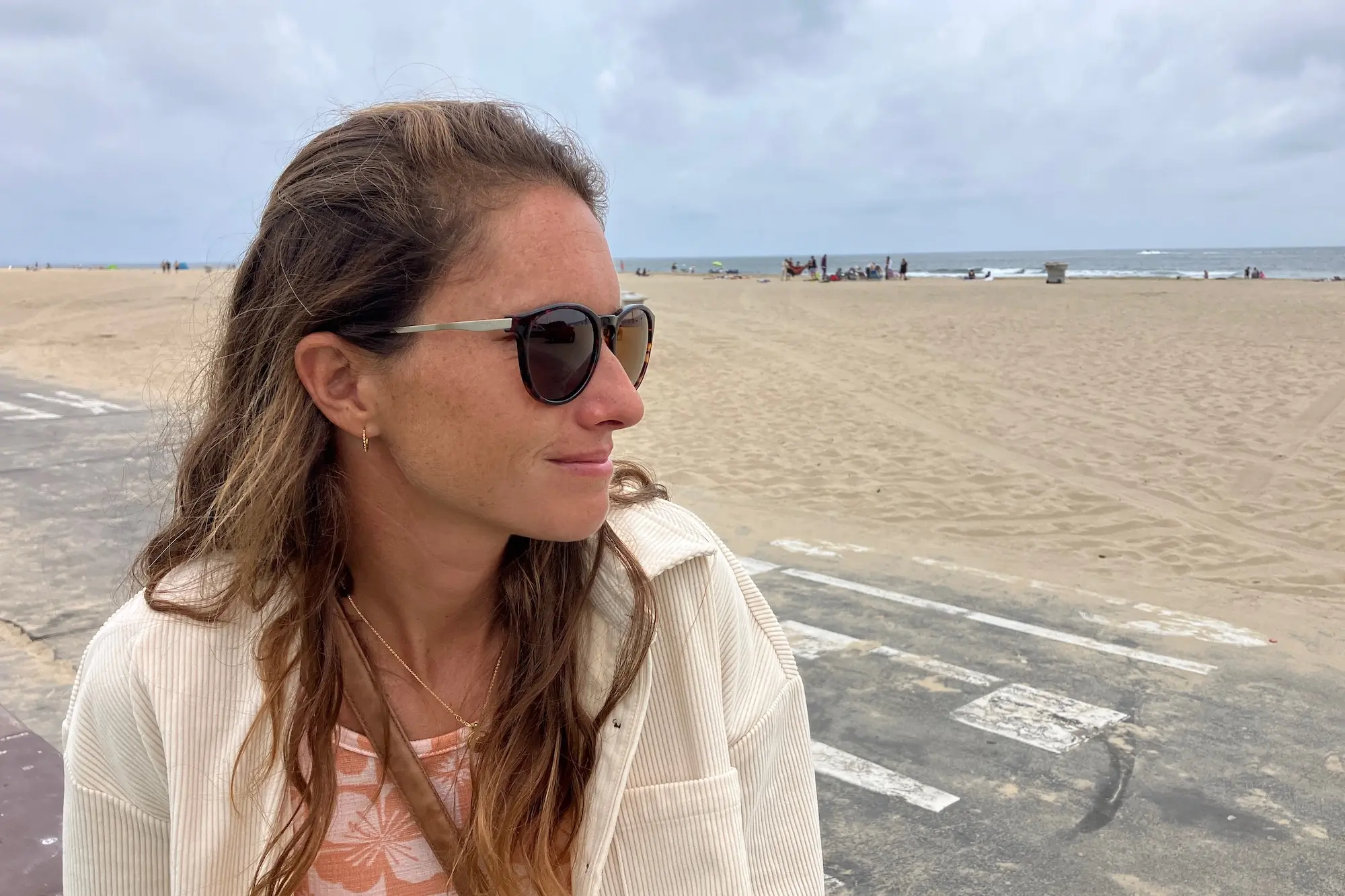 The author wearing the Smith Wander sunglasses at the beach on an overcast but bright day
