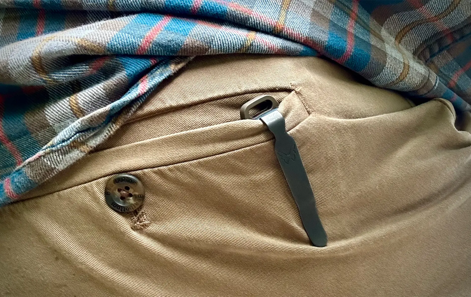 benchmade shootout otf knife secured with pocket clip inside the pocket