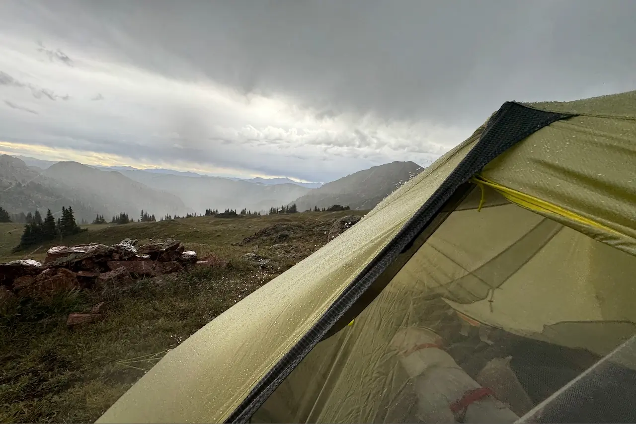 top of the NEMO Hornet OSMO 3P tent under a dark, stormy sky