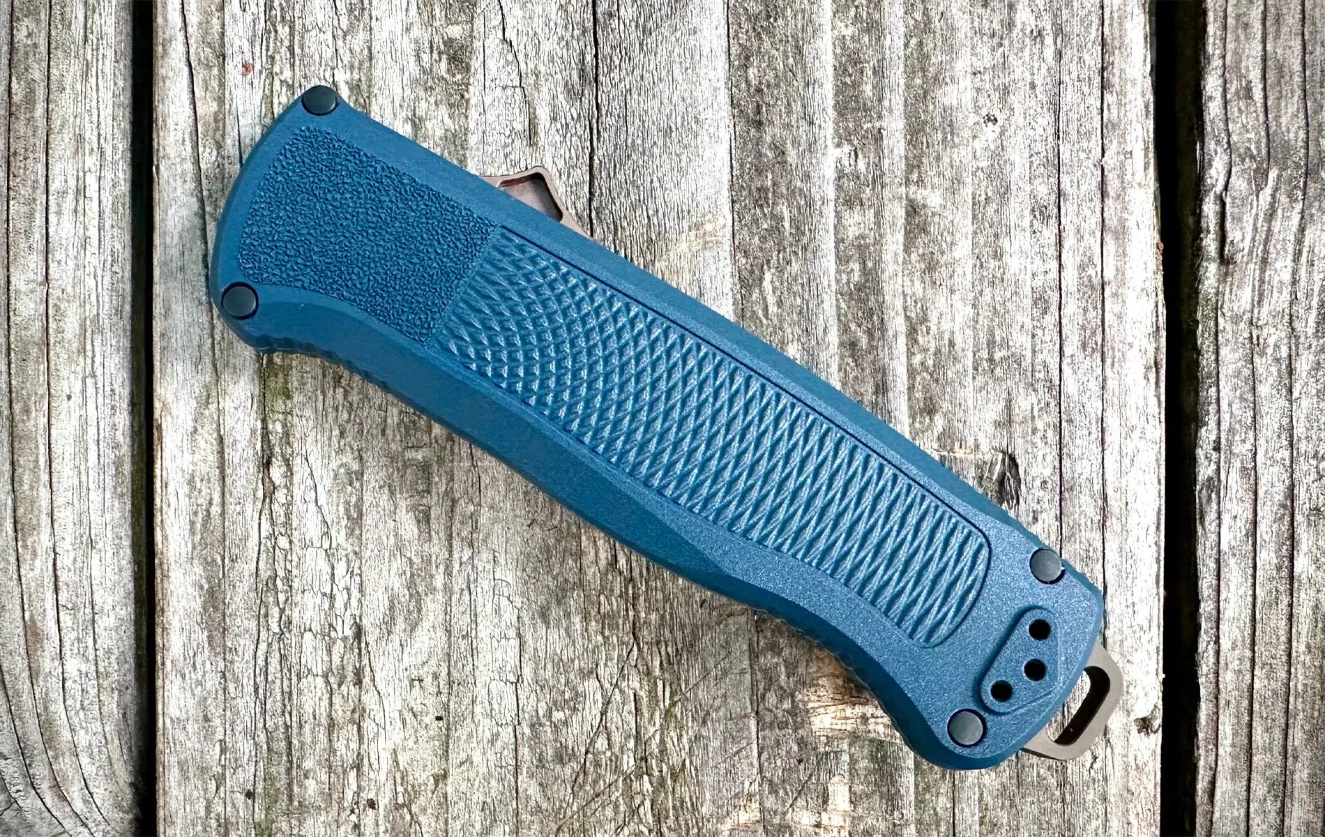 folded benchmade shootout otf knife