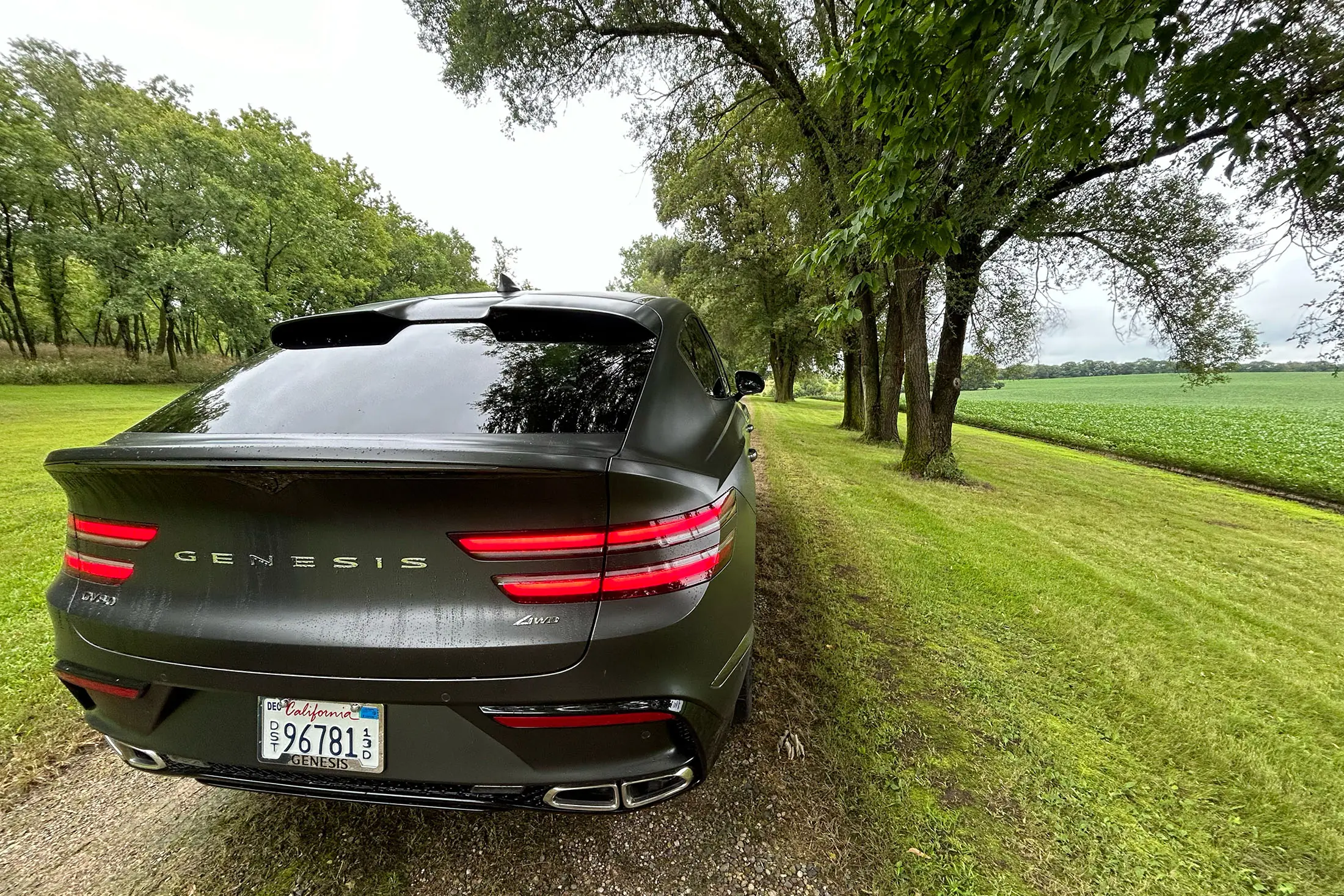 Genesis GV80 Coupe rear on dirt road