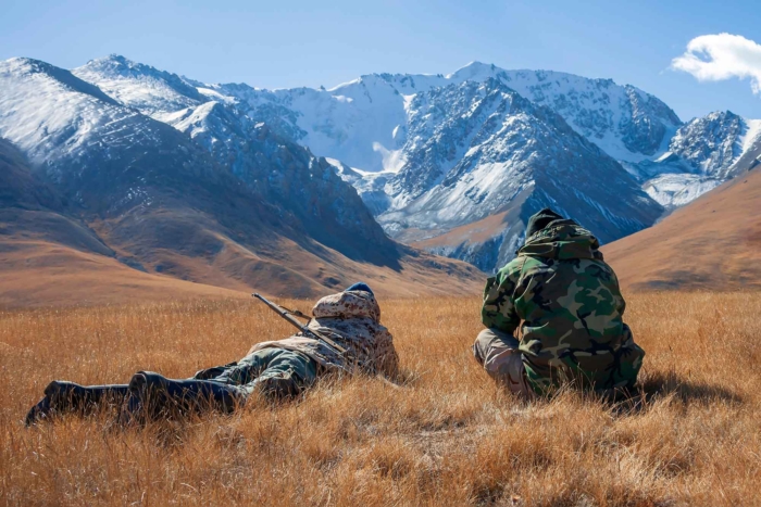 hunters in mountains