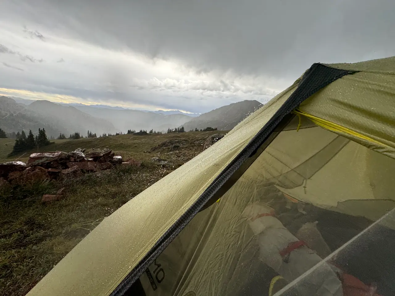 top of the NEMO Hornet OSMO 3P tent under a dark, stormy sky