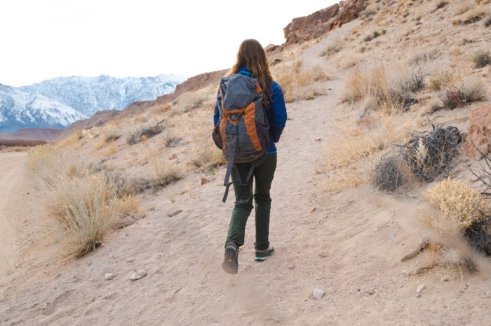 woman hiking in outdoor research ferrosi pants