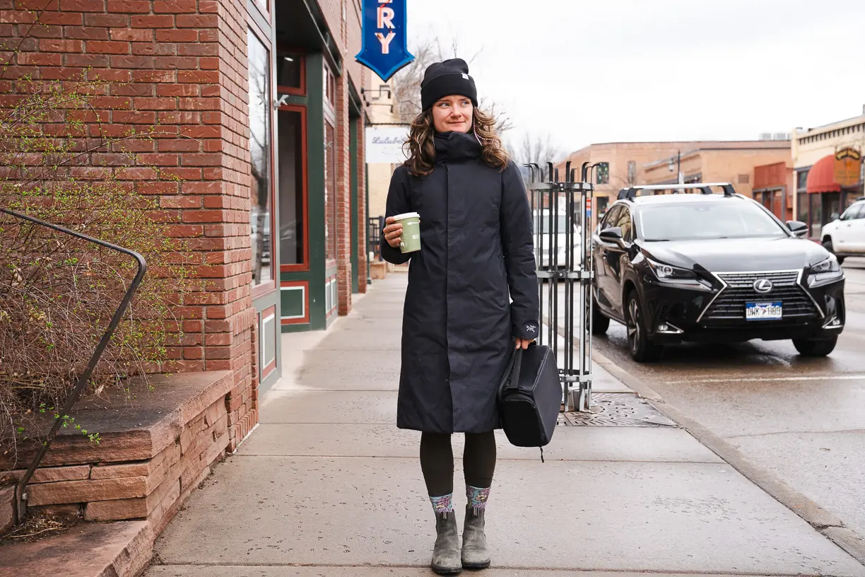 woman wearing the Arc’teryx Patera Parka on a street 