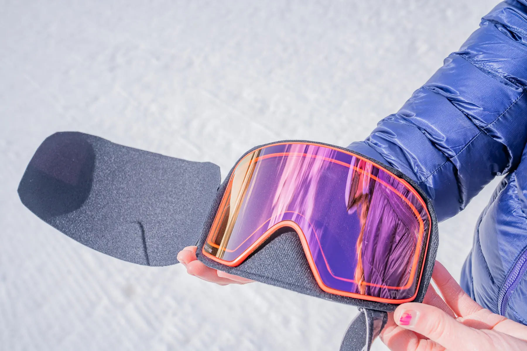 the Anon M4 Perceive Cloudy Pink lens in a case 