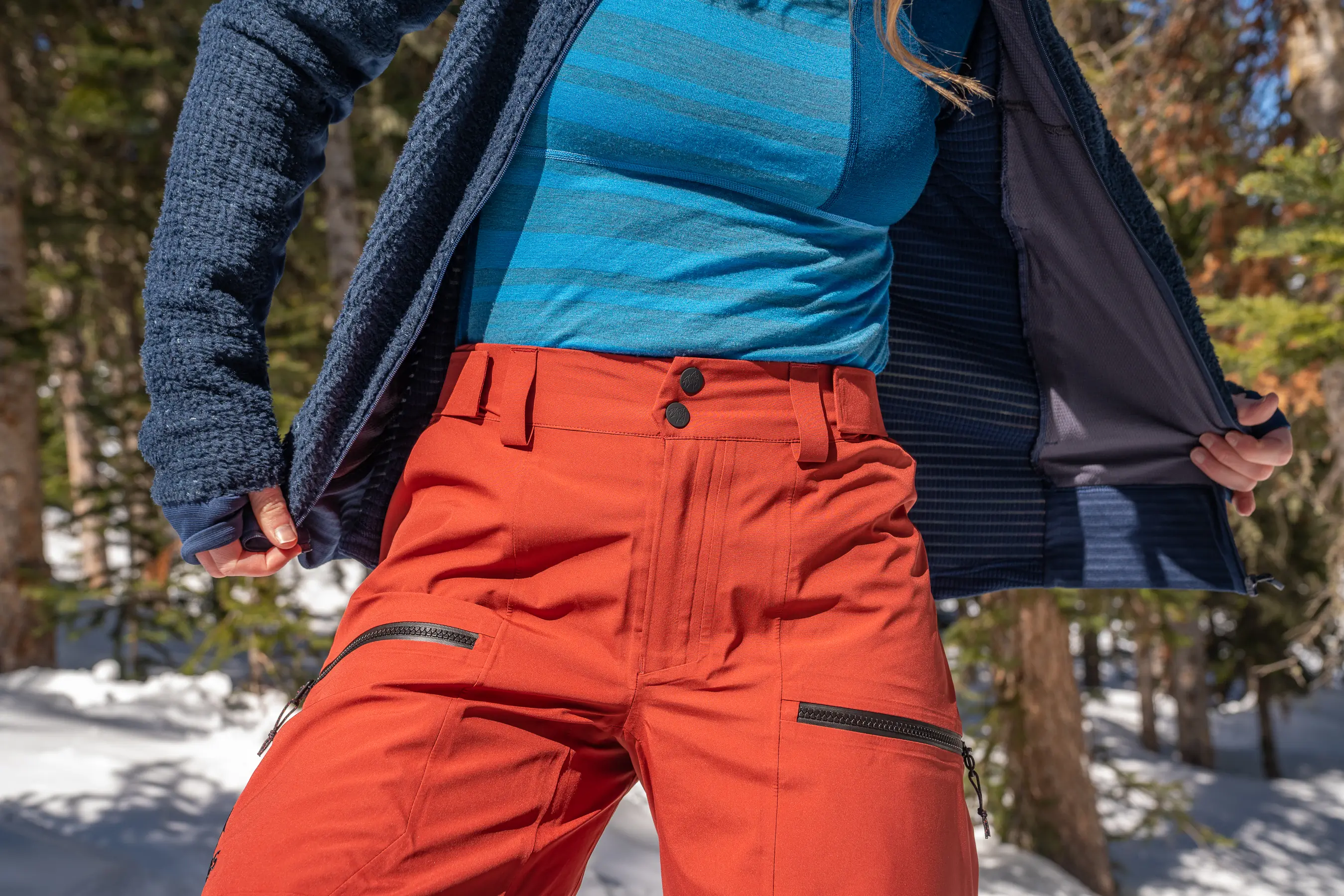 woman wearing light base layer and mid layer