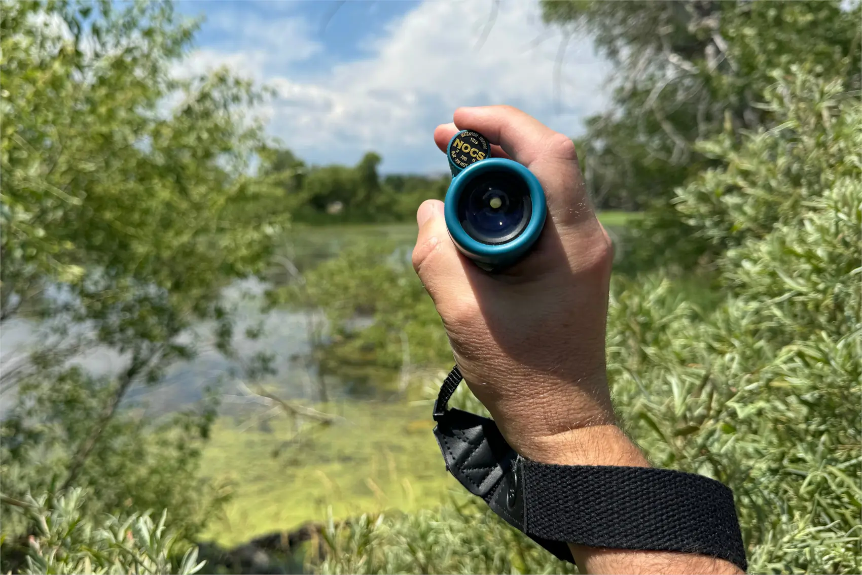 Nocs Provisions 8x32 Monocular Field Tube in hand