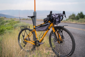REI ADV 2.2 bike is parked by the roadside