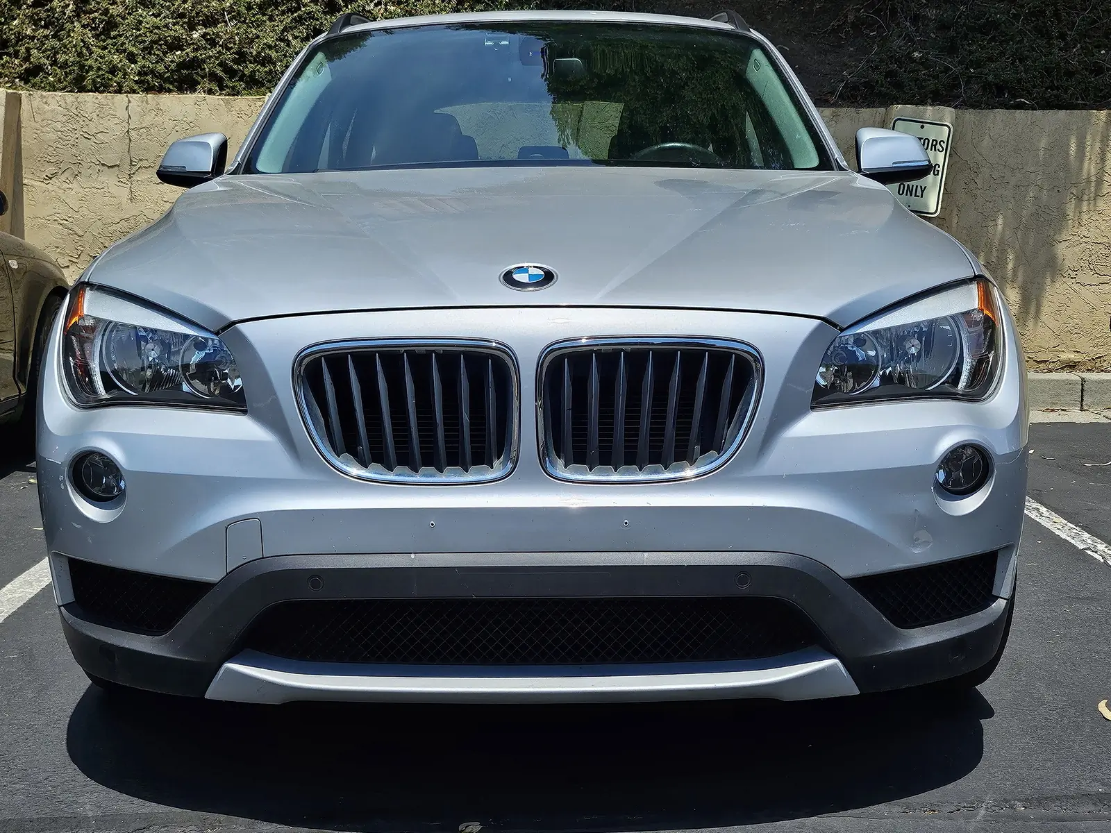 Headlight clarity was restored on this 2013 BMW X1 with the Meguiar's Ultimate kit; (photo/Derek Mau)