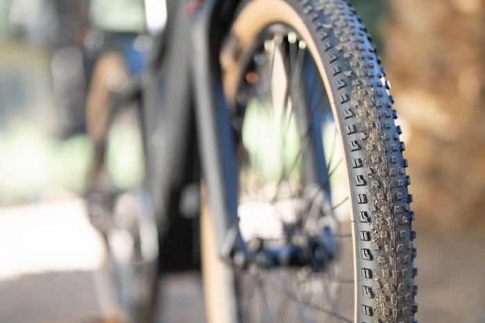 looking at the knobby tires of the Ride1Up Prodigy V2