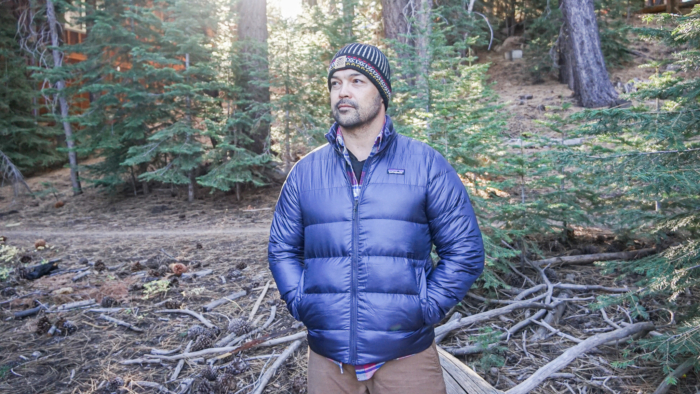 A handsome man models the Patagonia Tres 3-in-1 Parka.