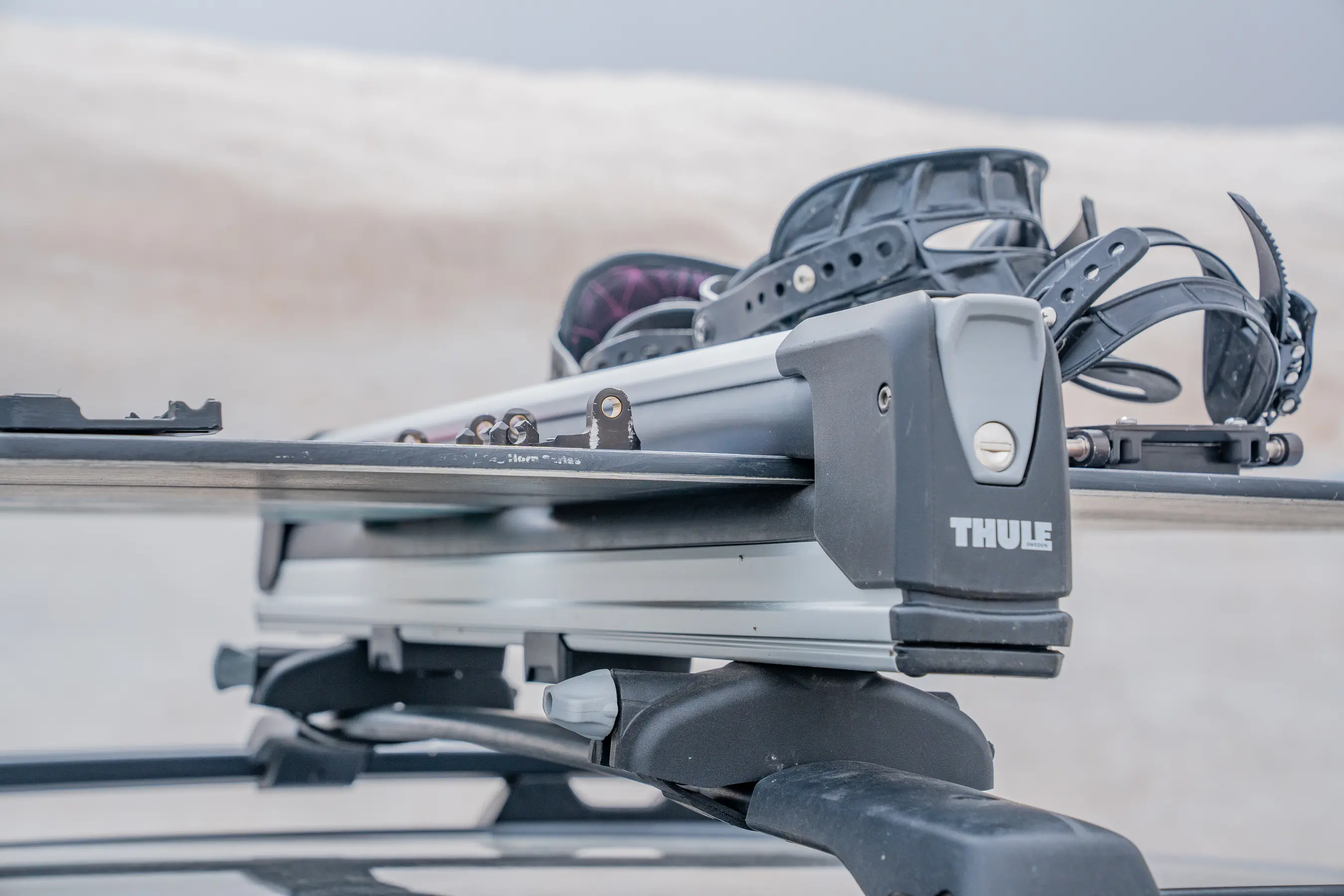 Like most racks, the Thule SnowPack Extender Ski/Snowboard Rack includes a locking arm; (photo/Eric Phillips)