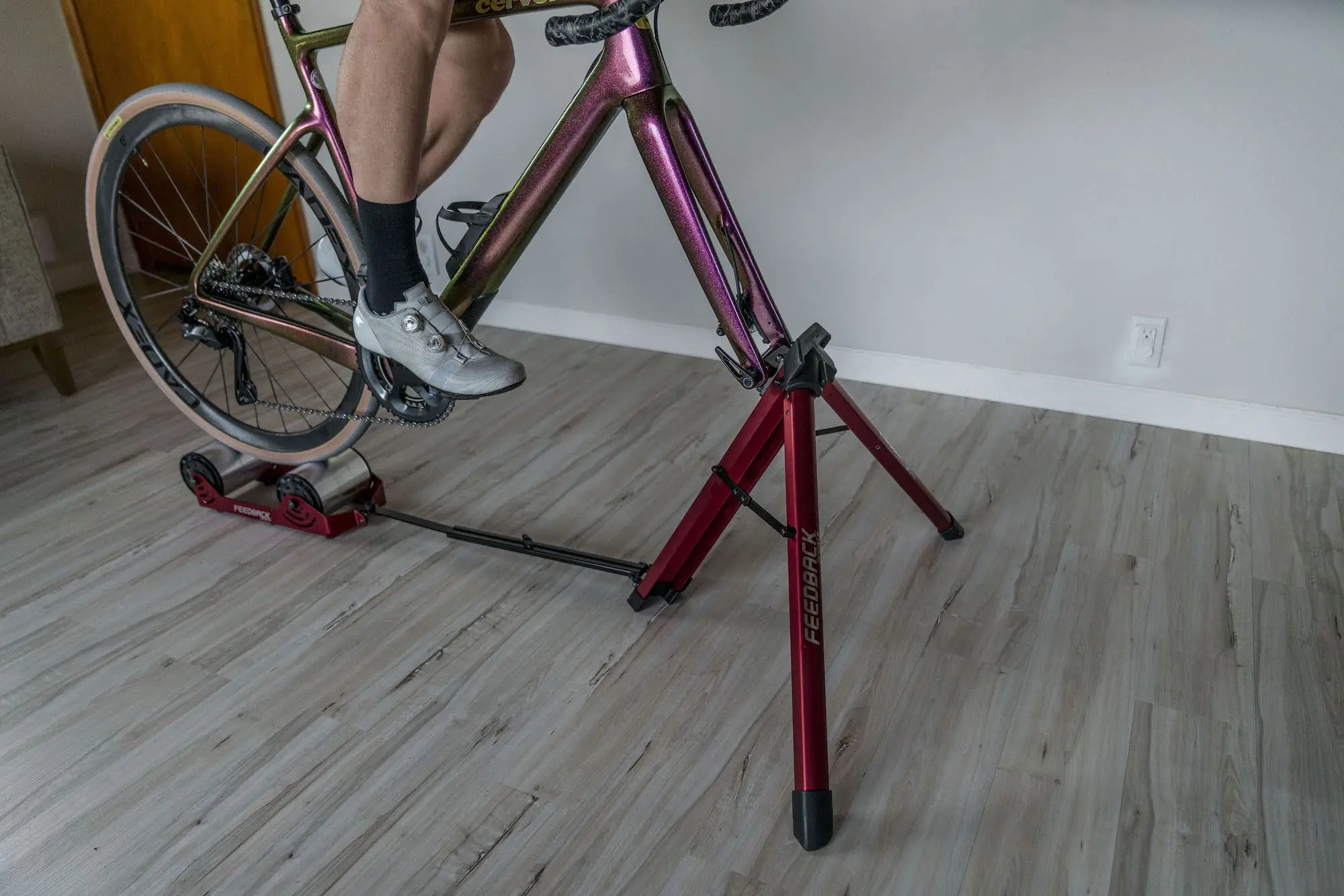 Riding the portable Feedback Sport Omnium Over-drive bike trainer indoors