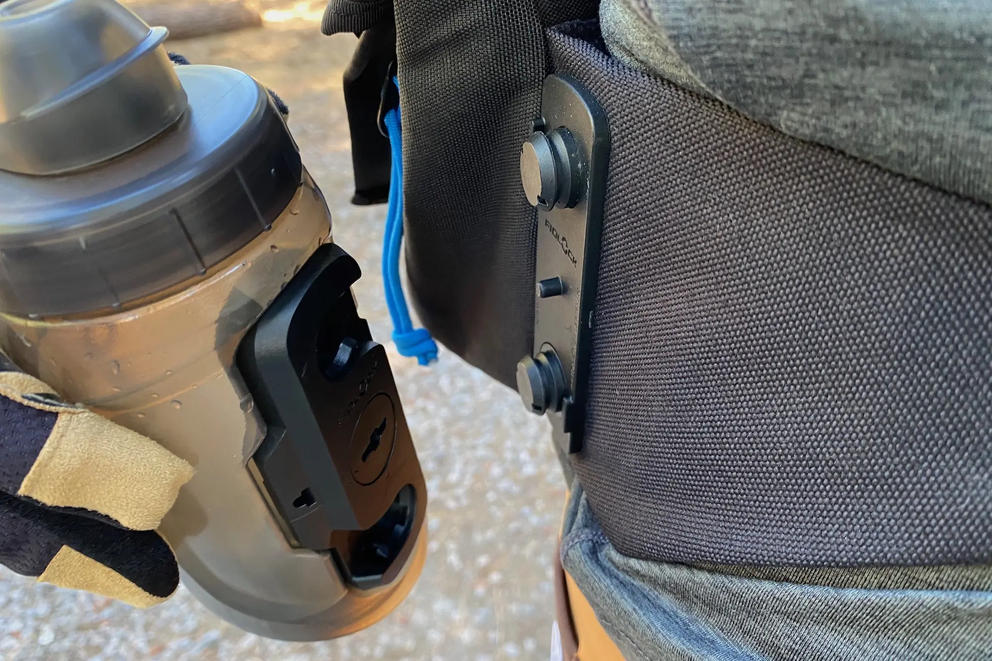 The Fidlock water bottle and attachment on the High Above Venture pack