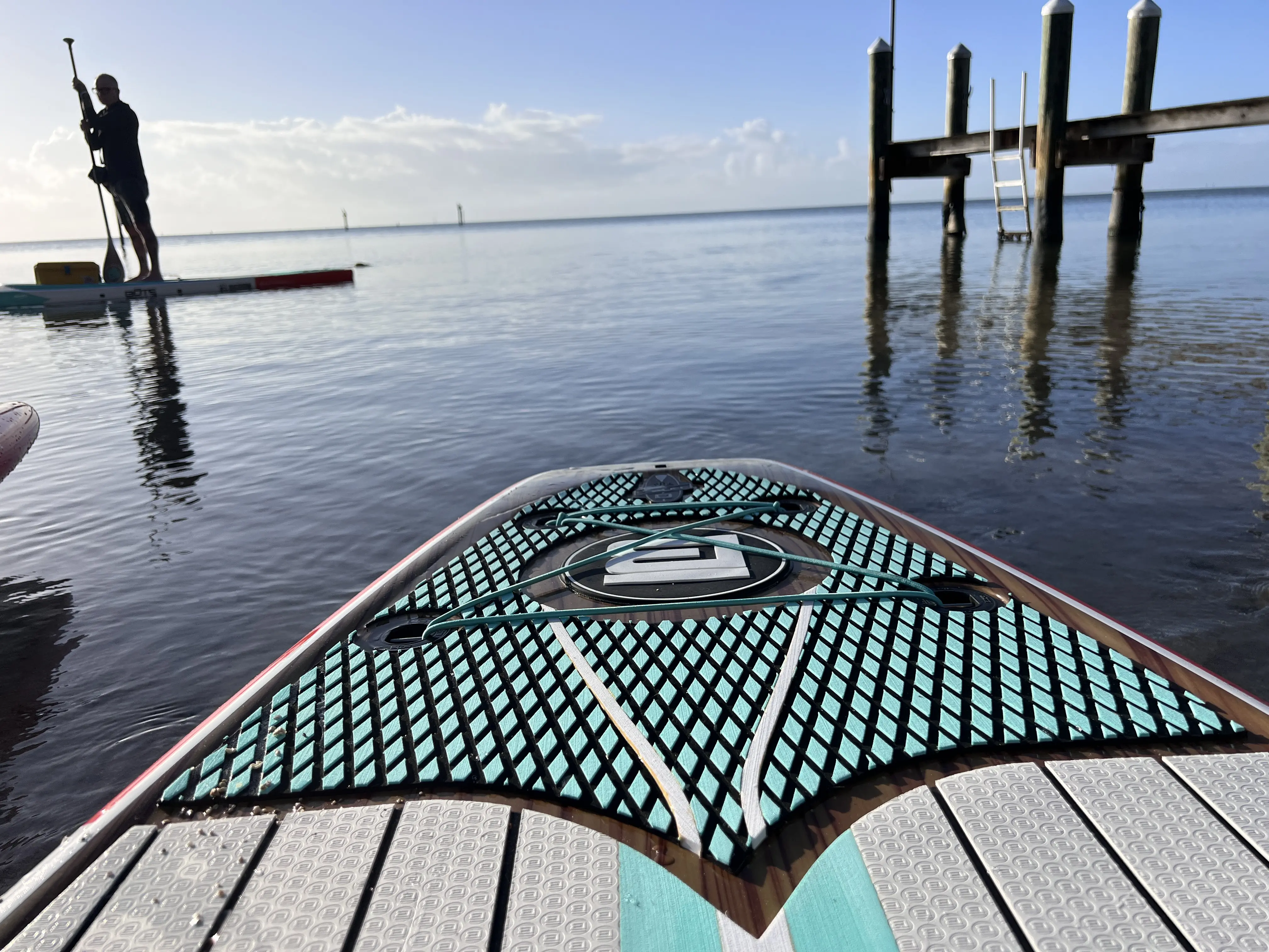 Bungee cords are often placed on the front, back, or both ends of the SUP to hold gear like dry bags or jackets; (photo/Morgan Tilton)