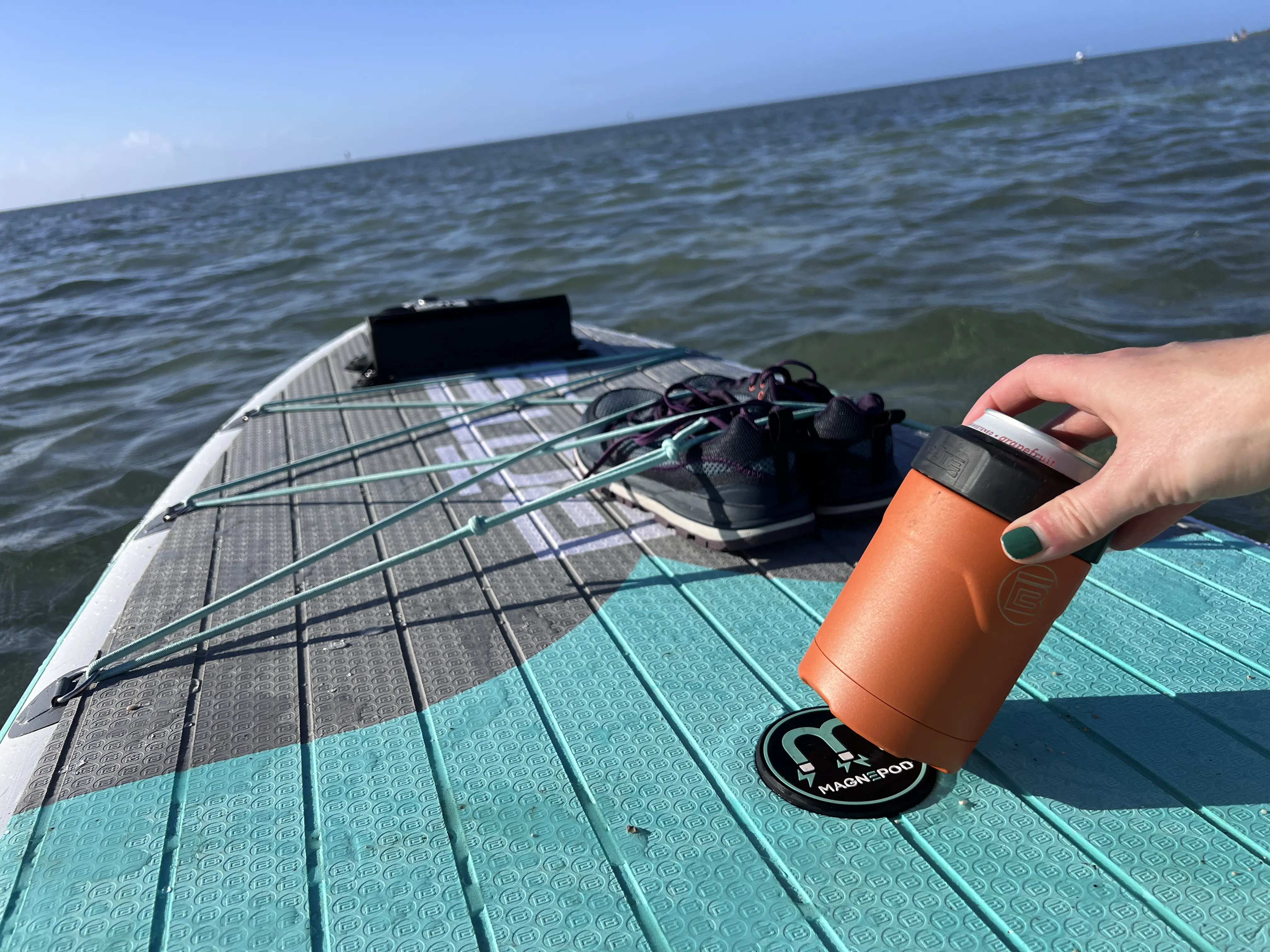 BOTE MAGNEPOD connects accessories to boards via powerful magnets, and some models have a paddle sheath to hold your paddle while you fish; (photo/Morgan Tilton)