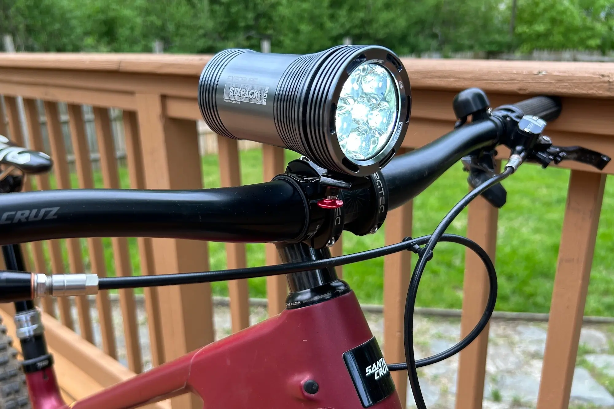 The Exposure Six-Pack Mk13 mounted to a mountain bike handlebar