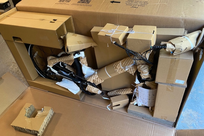 The Lectric XPress 750 electric commuter bike in its original packaging before assembly