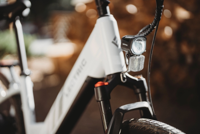 The integrated headlight and suspension fork on the Lectrc XPress 750 electric commuter bike