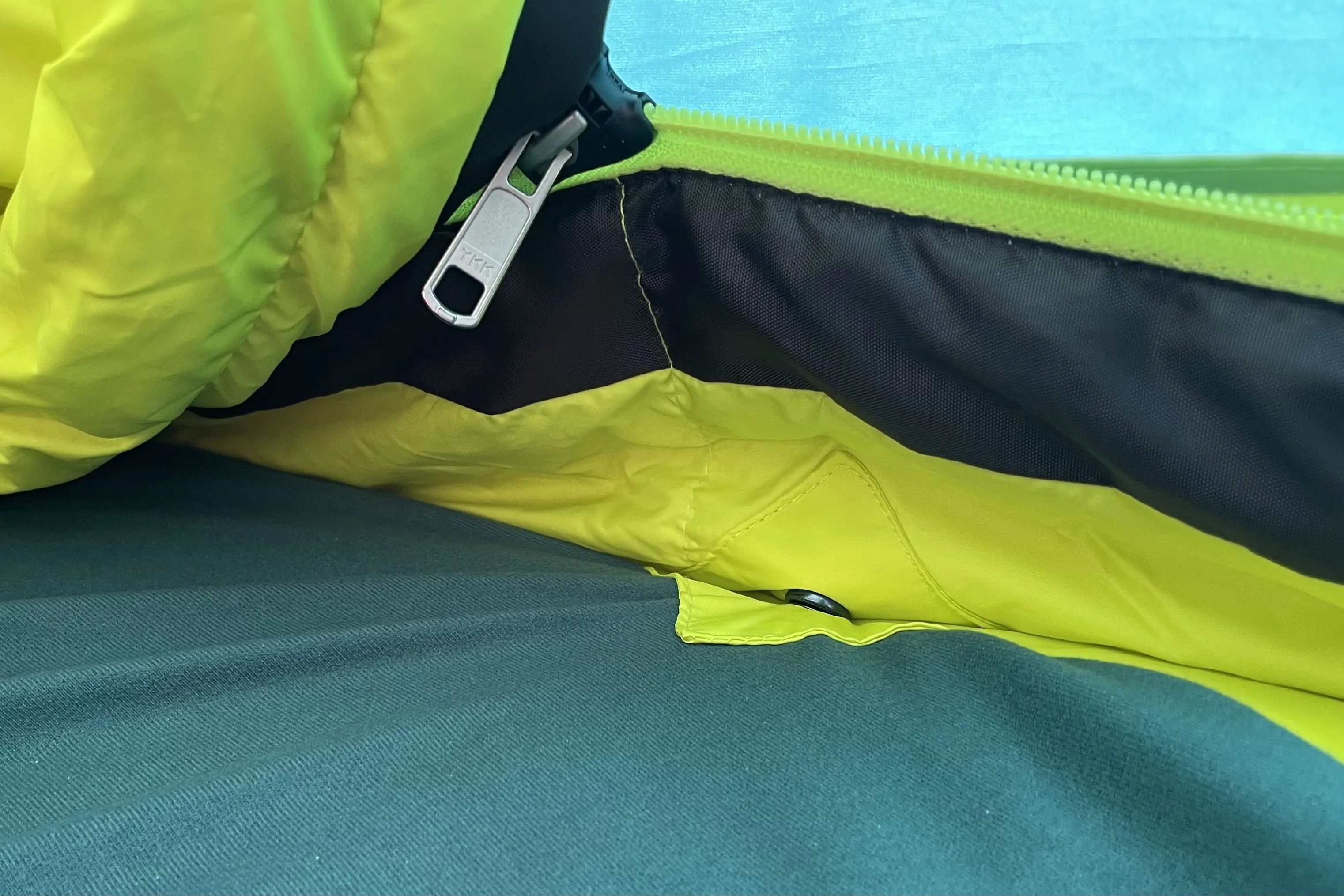 big zipper and blanket snapped to the side