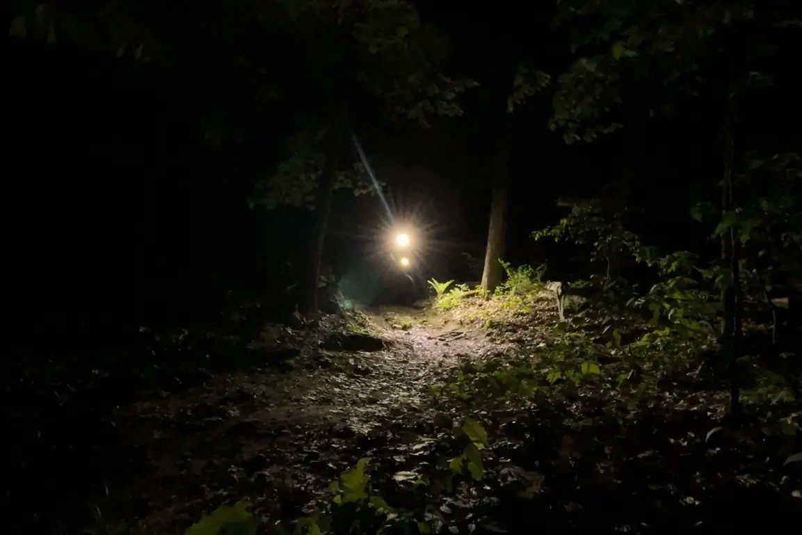 Riding at night while testing mountain bike lights