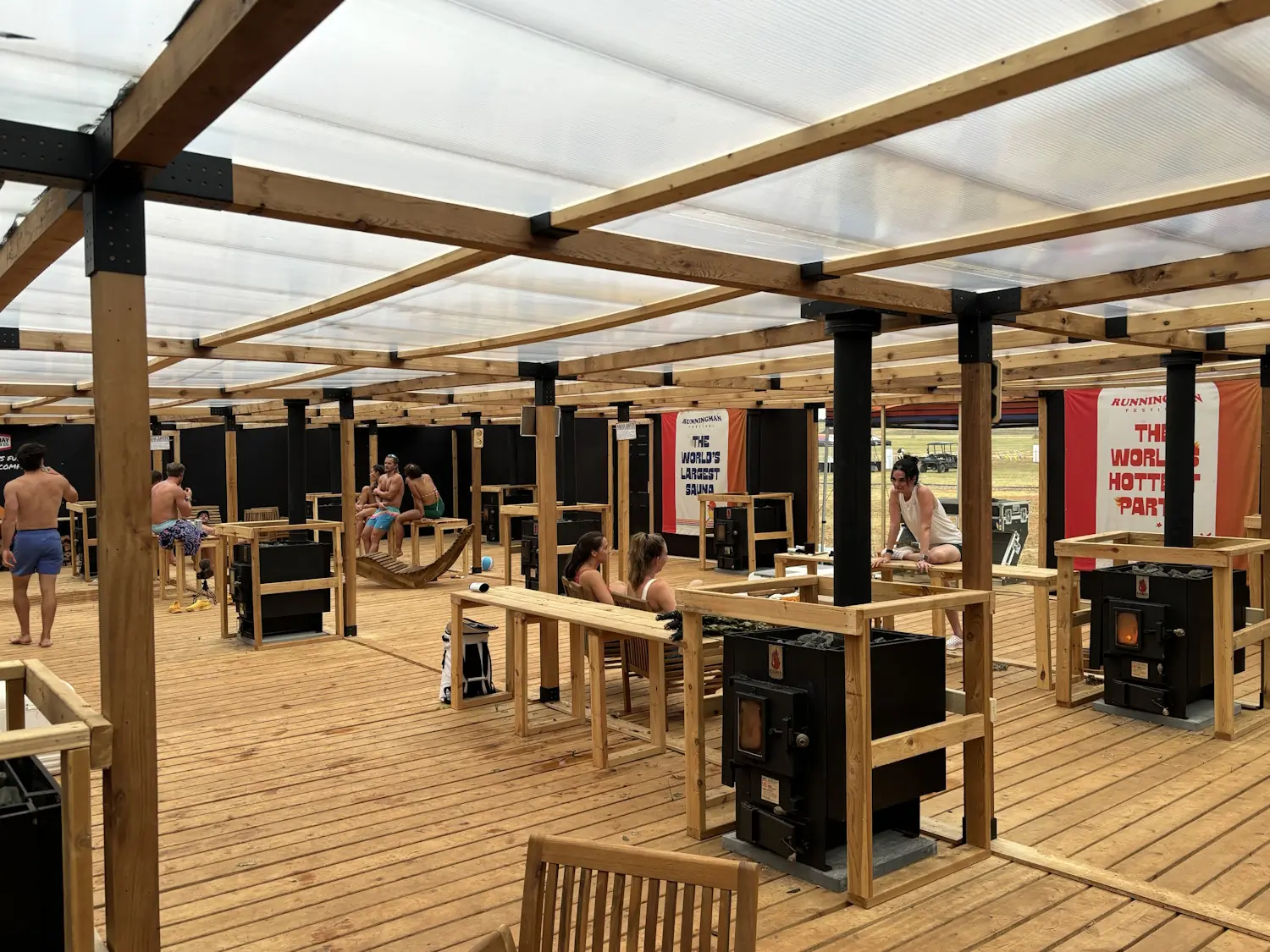 Sauna at the running man festival with people in swimsuits inside